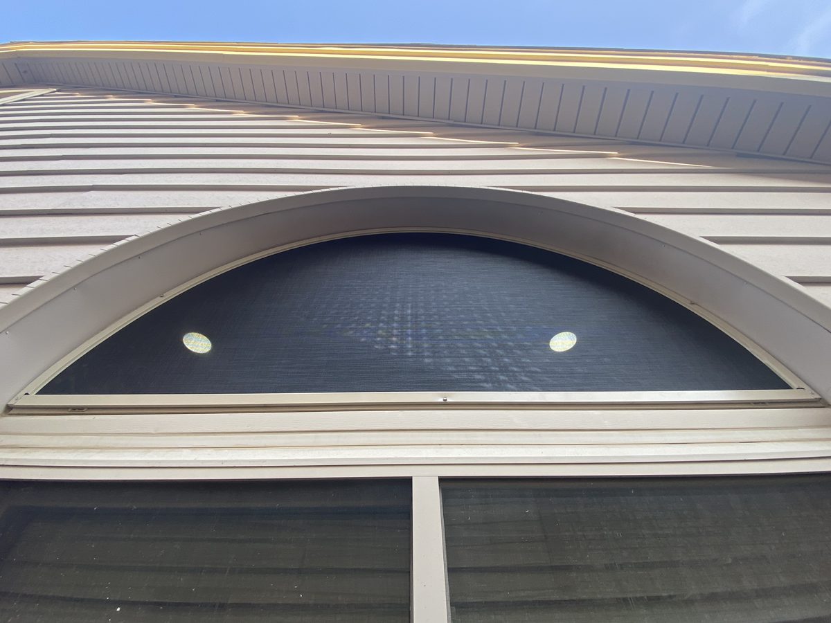 Arched transom window solar screen